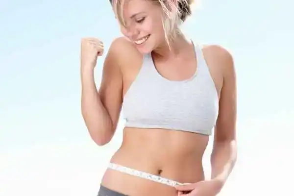 Unraveling the Mystery: Where Does the Body Fat Loss From First? 3 Image of woman happy with fat loss Market Harborough